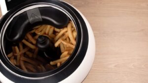 Tefal Actifry Genius Snaking FZ761015 Fritteuse ohne Öl, 1,2 kg, mit 9 Automatikprogrammen und Snackzubehör, intuitives Touchpad und Rezeptbuch, spülmaschinenfest, schwarz - Image 5