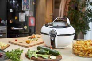 Tefal Actifry Genius Snaking FZ761015 Fritteuse ohne Öl, 1,2 kg, mit 9 Automatikprogrammen und Snackzubehör, intuitives Touchpad und Rezeptbuch, spülmaschinenfest, schwarz - Image 2